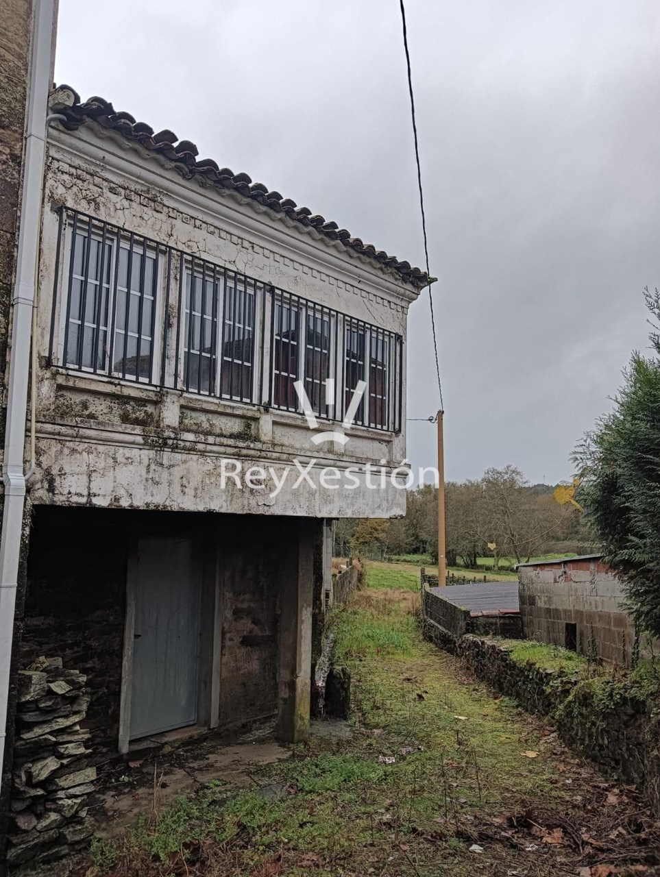 Foto 10 CASA UNIFAMILIAR DE PEDRA (con terreno e 2 naves multiuso) en Lavacolla - Santiago de Compostela