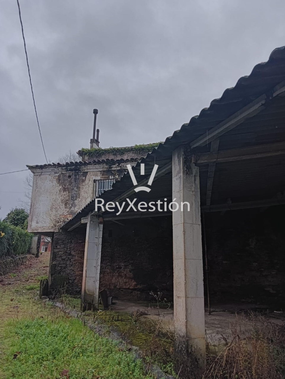 Foto 11 CASA UNIFAMILIAR DE PEDRA (con terreno e 2 naves multiuso) en Lavacolla - Santiago de Compostela