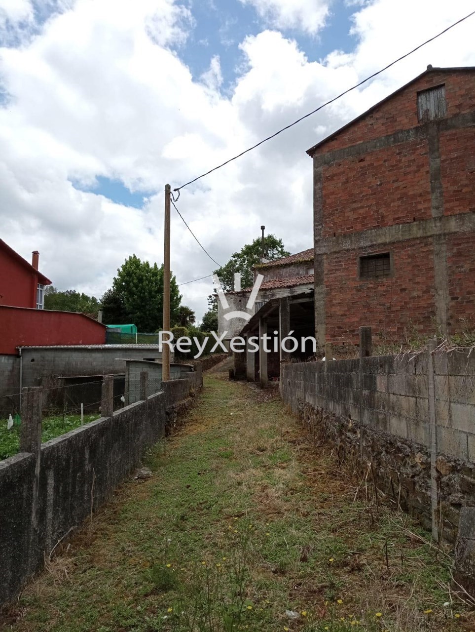 Foto 15 CASA UNIFAMILIAR DE PEDRA (con terreno e 2 naves multiuso) en Lavacolla - Santiago de Compostela