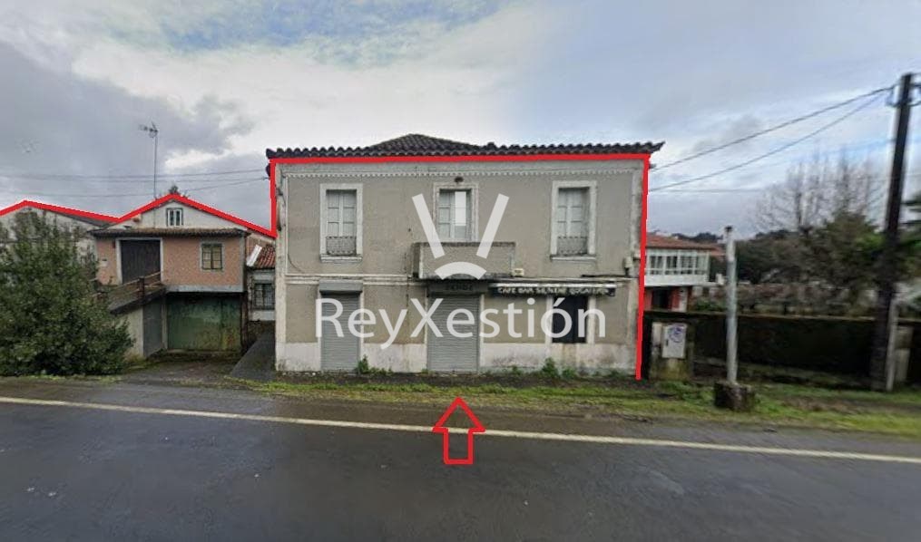 Foto 2 CASA UNIFAMILIAR DE PEDRA (con terreno e 2 naves multiuso) en Lavacolla - Santiago de Compostela
