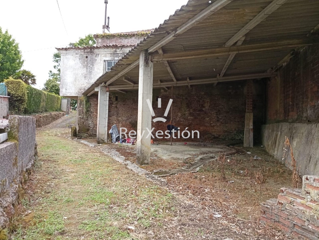 Foto 13 CASA UNIFAMILIAR DE PEDRA (con terreno e dúas naves multiuso) en Lavacolla