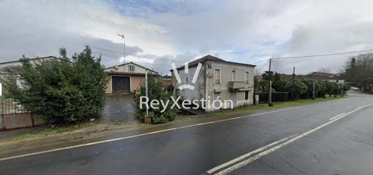 Foto 17 CASA UNIFAMILIAR DE PEDRA (con terreno e dúas naves multiuso) en Lavacolla