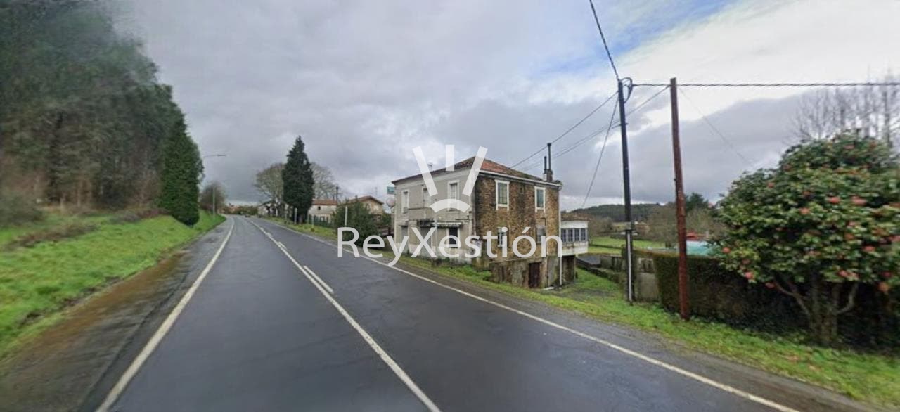 Foto 4 CASA UNIFAMILIAR DE PEDRA (con terreno e dúas naves multiuso) en Lavacolla