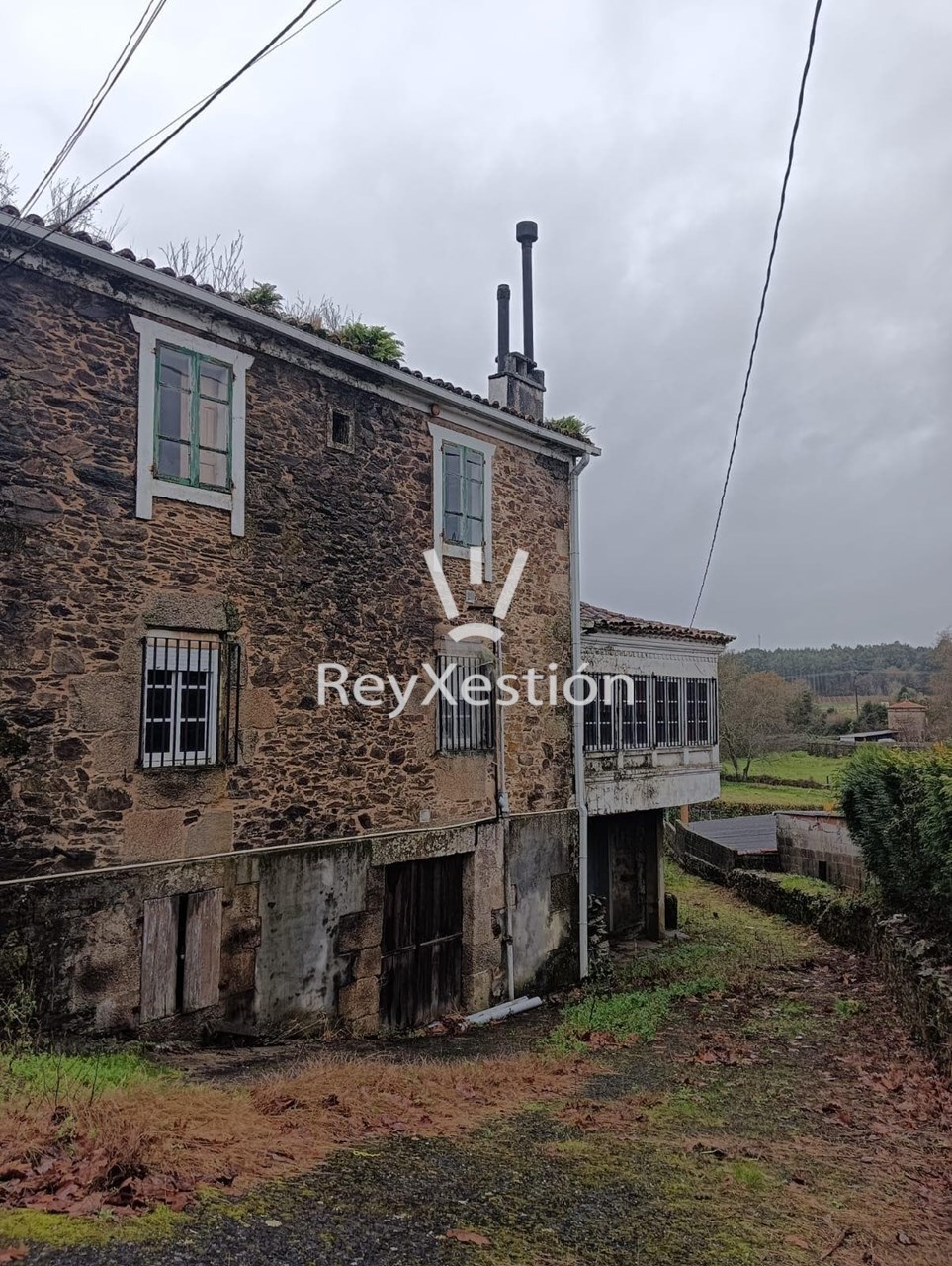 Foto 27 CASA UNIFAMILIAR DE PIEDRA PARA REHABILITAR - CON TERRENO Y DOS NAVES EN LAVACOLLA