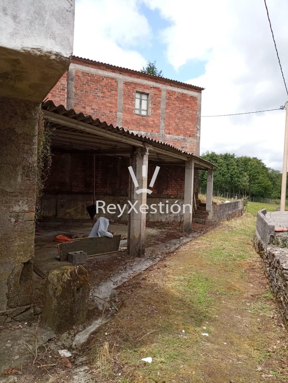 Foto 6 CASA UNIFAMILIAR DE PIEDRA PARA REHABILITAR - CON TERRENO Y DOS NAVES EN LAVACOLLA
